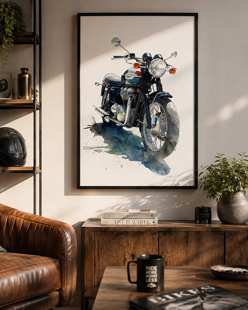 A framed watercolor-style motorcycle print hangs on a beige wall in a styled living room with a brown leather sofa, wooden console, shelf, and plants.